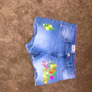 Girls blue jeans with flower embellishments 10-12